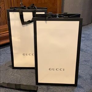 Gucci gift bags and Gucci logo ribbon